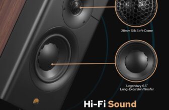 A black HiVi-Swans D3.1 MKII speaker, with a visible 6.5-inch driver, placed in a home interior setting. This is a high-fidelity passive bookshelf speaker.